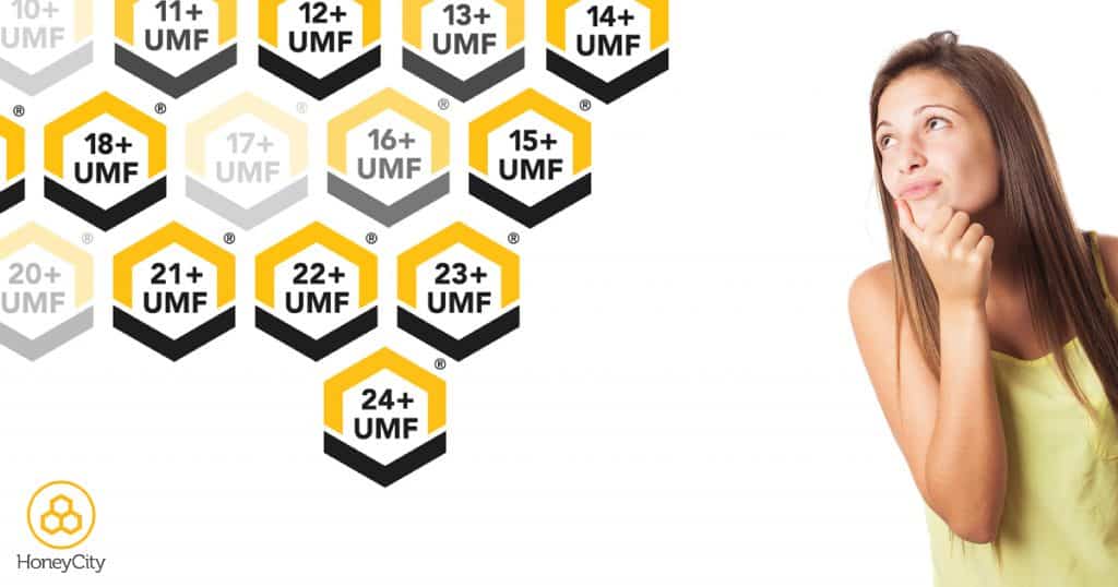 woman looking quizzical at the various types of honey UMF available